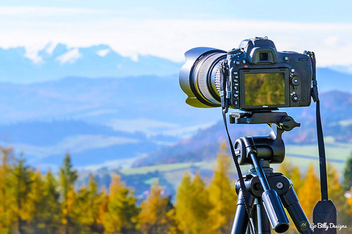 Photo of a nice camera taking a picture of mountains